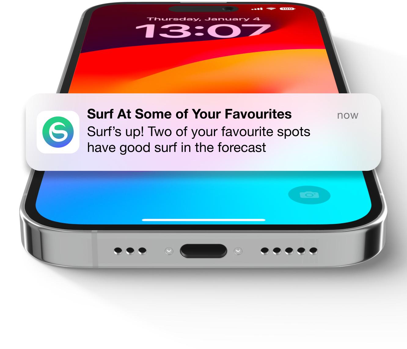 iPhone 15 laying flatshowing Swellify notification